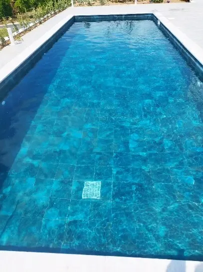 Renovated pool with clear turquoise water